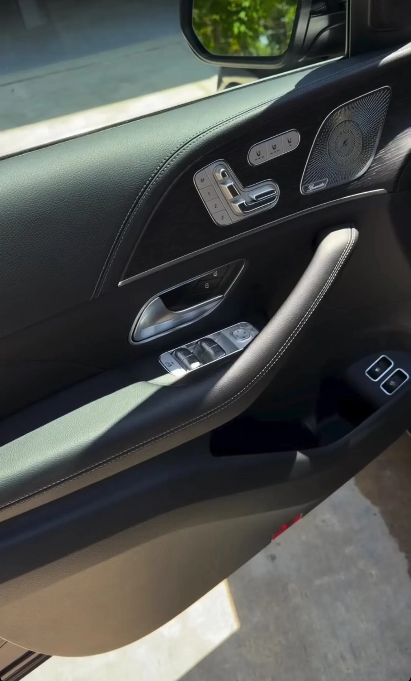 Detailed door panel and speaker grille on a Mercedes-Benz GLE