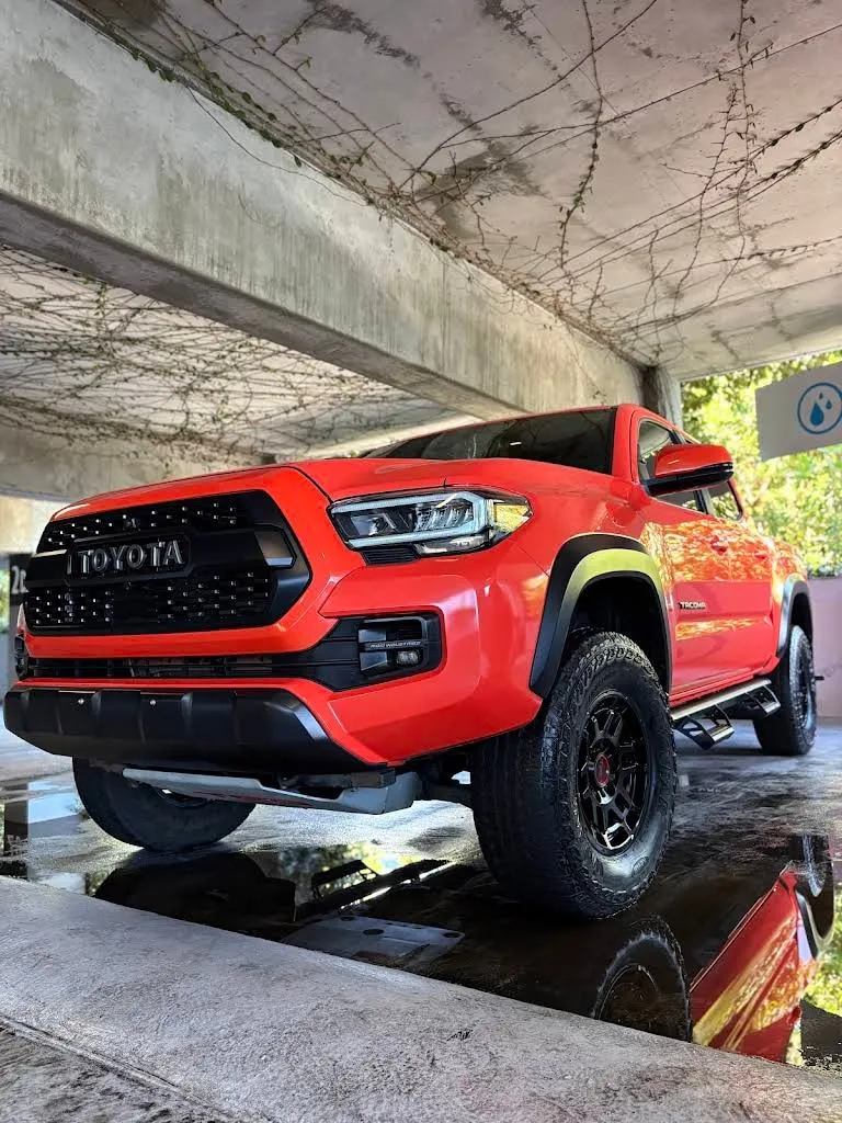 Toyota Tacoma TRD after detailing, front three-quarter view, customer photo